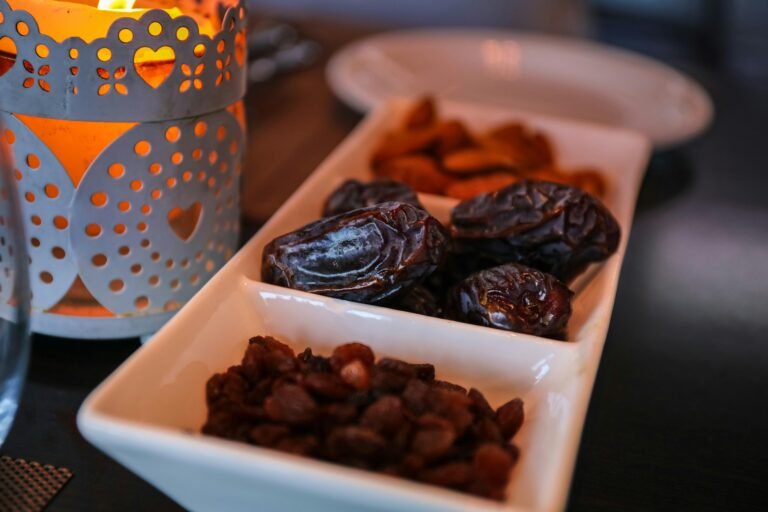 Close-up of dried dates and lantern symbolizing Ramadan traditions. Ideal for festive themes.