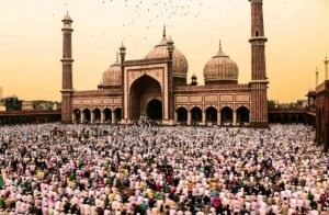 A large crowd gathers for prayer at the iconic Jama Masjid during Ramadan.